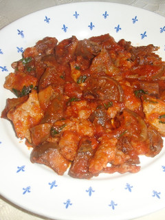 Una foto de Esclatasangs, magro y carne picada de cerdo con tomate