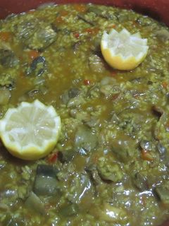 Una foto de Conejo con champiñón y arroz