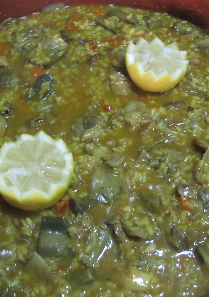 Una foto de Conejo con champiñón y arroz