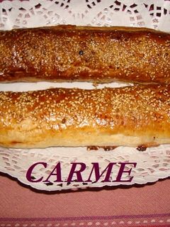 Una foto de Flauta de hojaldre rellena de pollo y queso