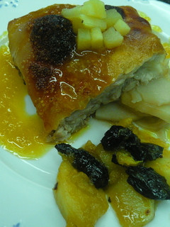 Una foto de Asados de cochinillo y cordero