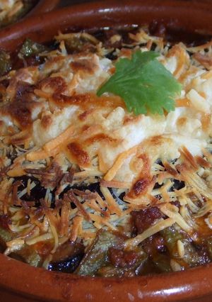 Una foto de Gratinado de setas con berenjenas y judías