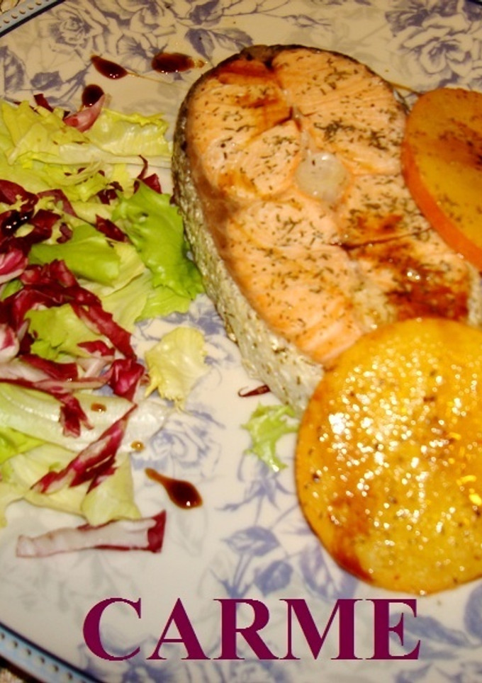 Una foto de Salmón y caqui persimon en papillotte