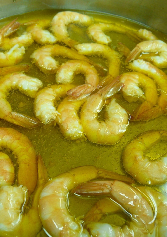 Una foto de Confitar langostinos