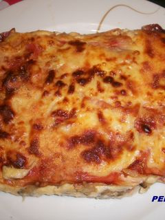 Una foto de Gratinado de berenjenas con jamón Iberico