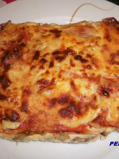 Una foto de Gratinado de berenjenas con jamón Iberico
