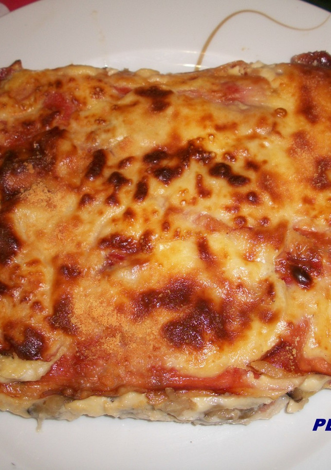 Una foto de Gratinado de berenjenas con jamón Iberico