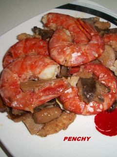 Una foto de Gambas con bacalao y setas al cava
