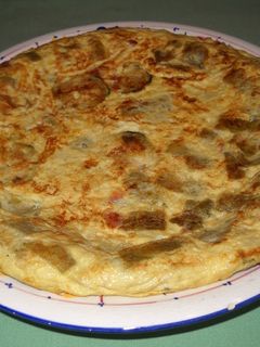 Una foto de Tortilla de calabacín, judías verdes y jamón