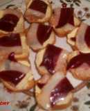 Canapés de jamón de pato y confitura de tomate