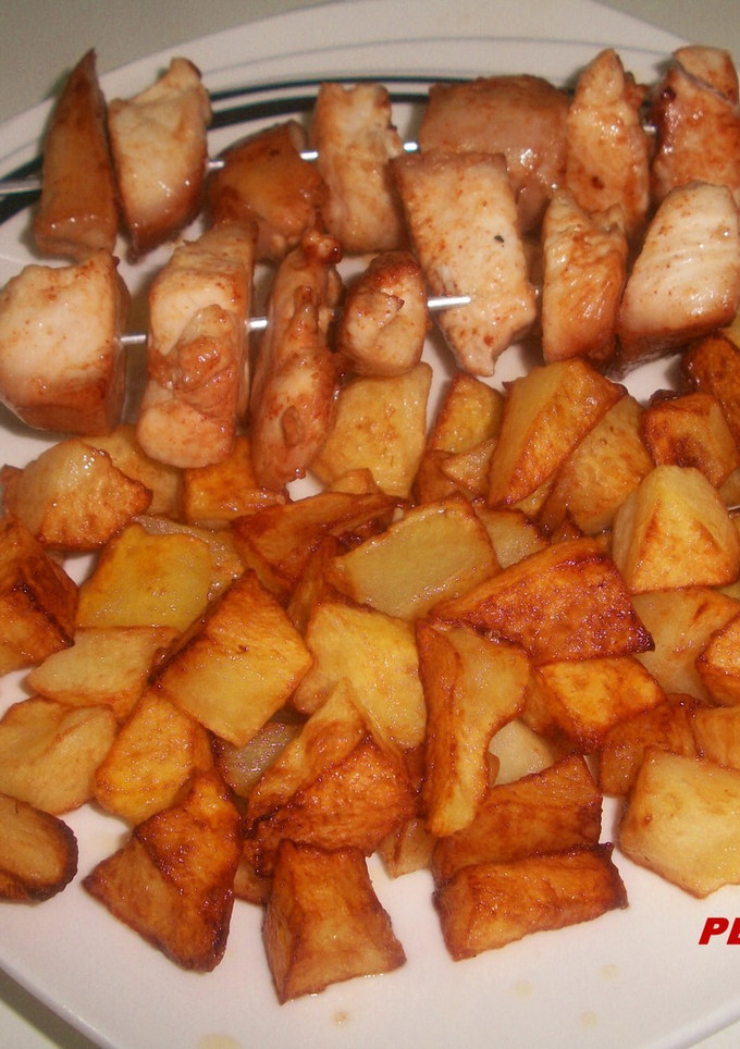Una foto de Pinchitos de pollo adobados
