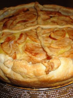 Una foto de Tarta de manzana y crema frangipane