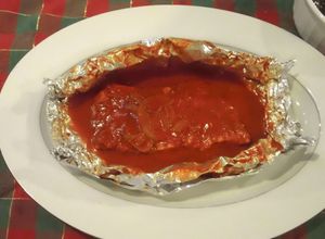 Una foto de Filetes empapelados al achiote