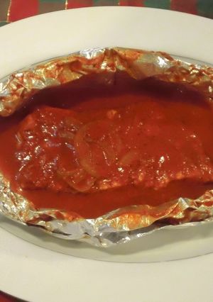 Una foto de Filetes empapelados al achiote