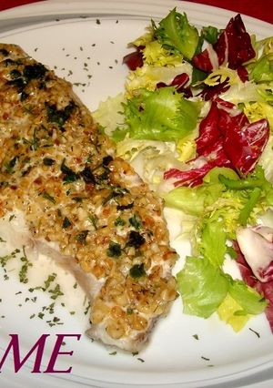 Una foto de Caella gratinada con salsa de almendras