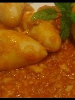 Una foto de Chipirones rellenos de jamón y gambas