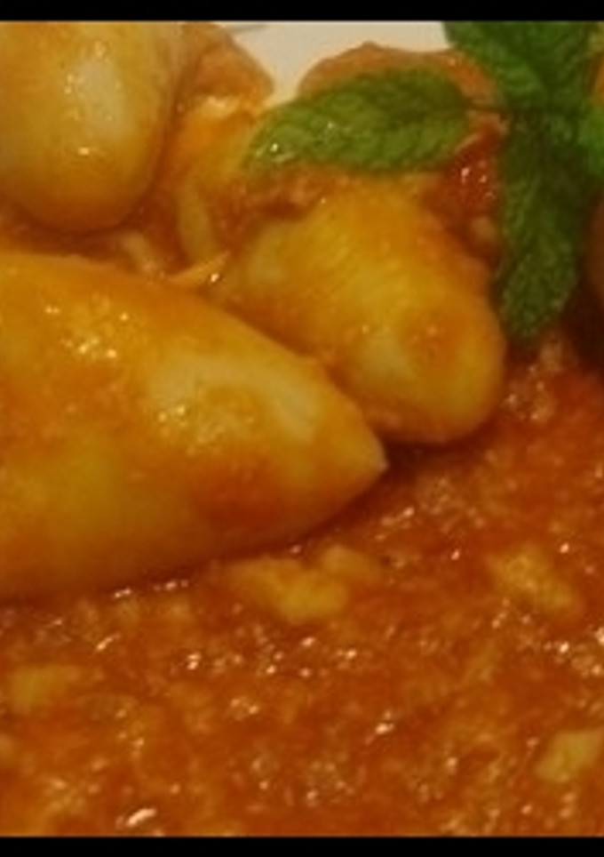 Una foto de Chipirones rellenos de jamón y gambas