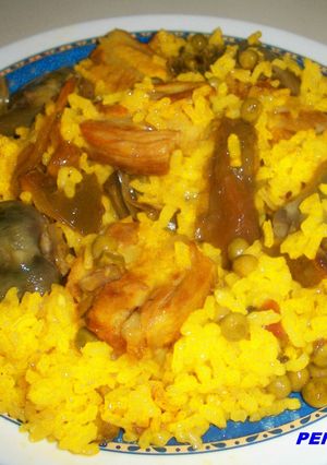 Una foto de Arroz con costillejas y verduras de mi madre