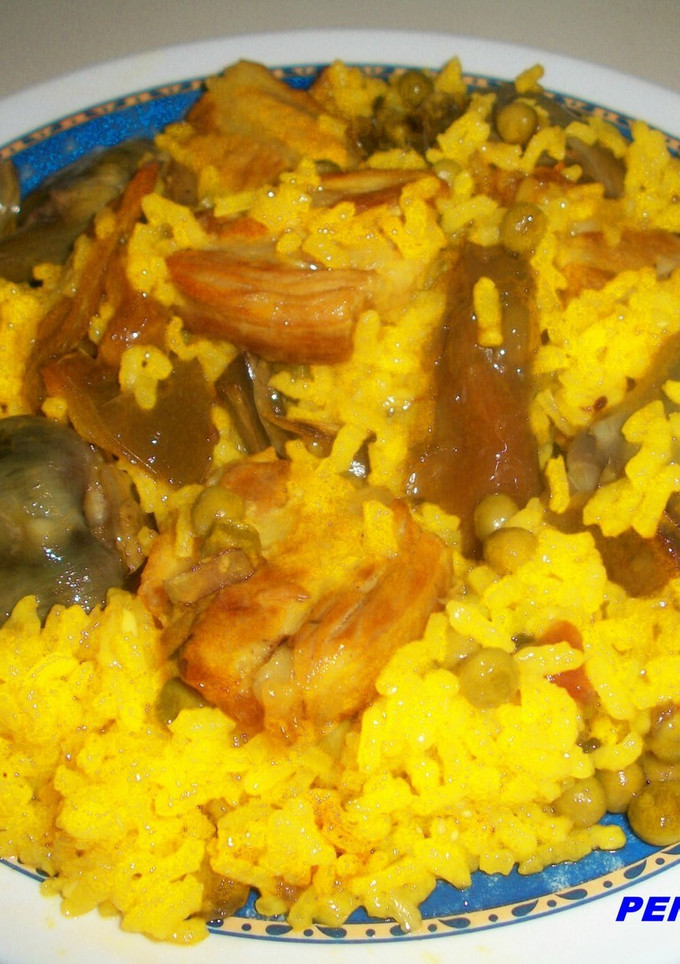 Una foto de Arroz con costillejas y verduras de mi madre