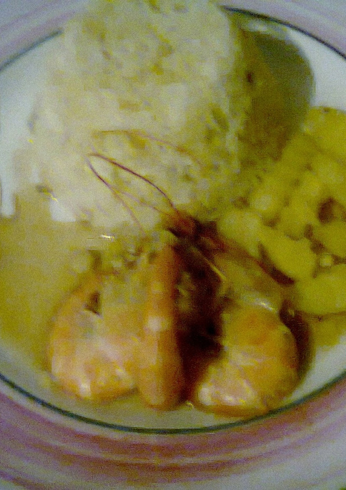 Una foto de Langostino al ajillo en salsa de ostión