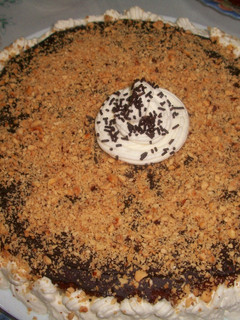 Una foto de Tarta al cava con crema de limón y cobertura de chocolate