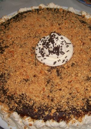 Una foto de Tarta al cava con crema de limón y cobertura de chocolate
