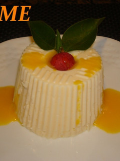 Una foto de Flan light de queso y mandarina