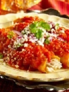 Una foto de Enchiladas rojas de pollo