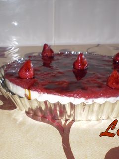 Una foto de Tarta de queso con miel y frambuesa