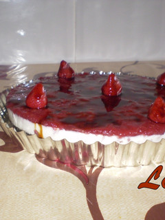 Una foto de Tarta de queso con miel y frambuesa