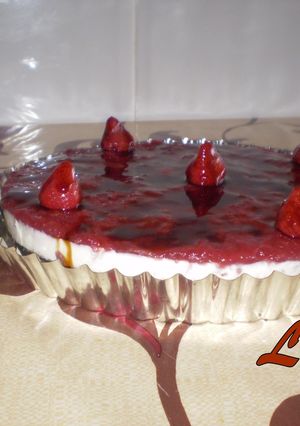 Una foto de Tarta de queso con miel y frambuesa