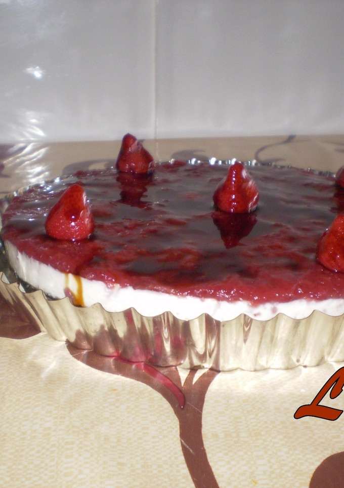 Una foto de Tarta de queso con miel y frambuesa