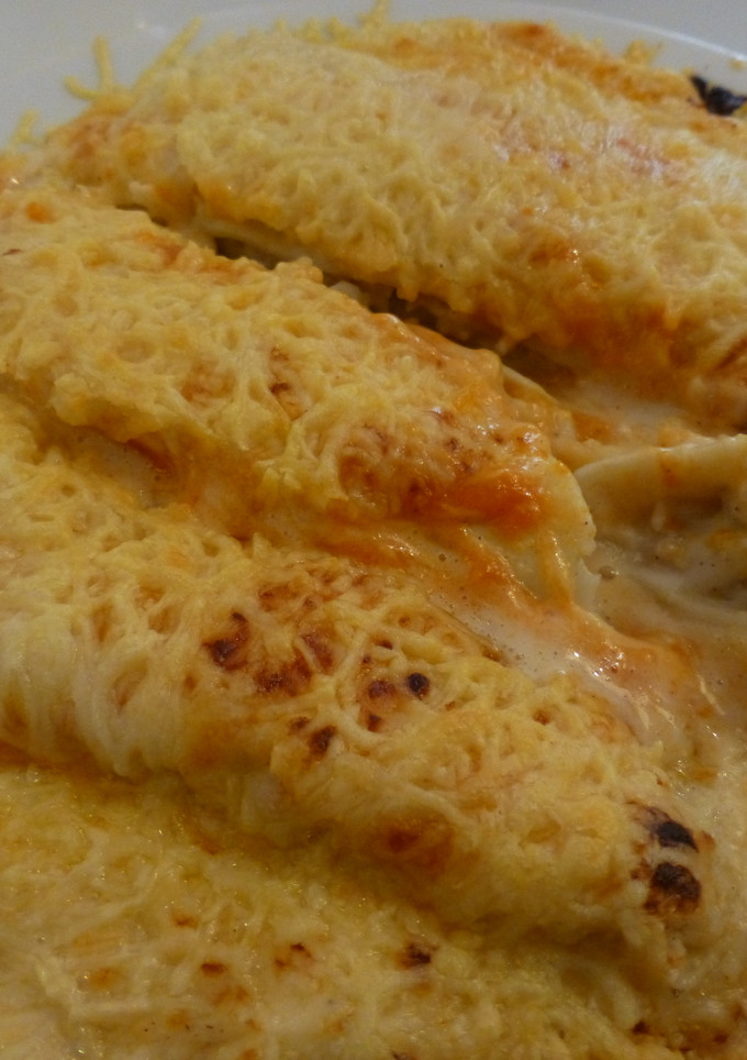 Una foto de Canelones de gambas y cigalas