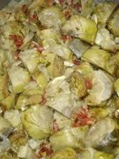 Una foto de Alcachofas con jamón y perejil