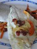 Dorada en papillote con pasas
