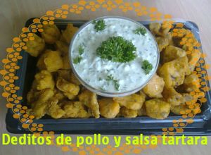 Una foto de Deditos de pollo apanados en salsa tartara