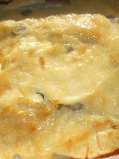 Una foto de Filetes de merluza con cubierta de mayonesa
