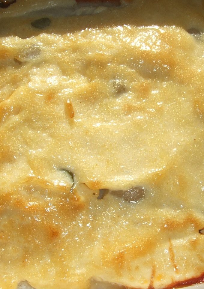 Una foto de Filetes de merluza con cubierta de mayonesa