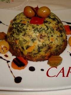 Una foto de Pastel de arroz y acelgas