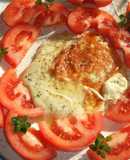 Provoletta a la parrilla con tomates