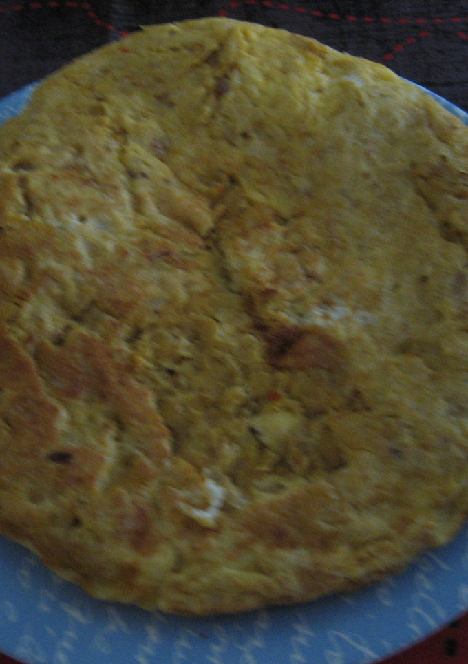 Una foto de Ropa vieja de cocido en tortilla
