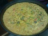 Arroz con rape, almejas, setas y ajetes