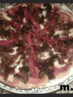 Una foto de Pizza de cocido