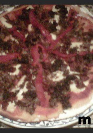 Una foto de Pizza de cocido
