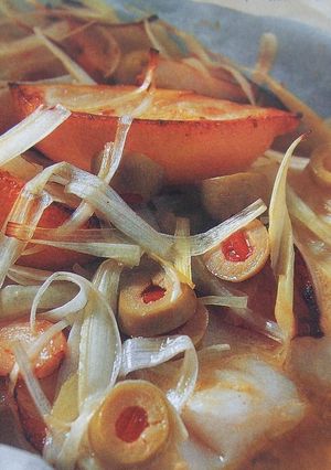Una foto de Merluza en papillote con calabacita asada