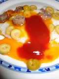 Huevos con aceitunas y anchoas