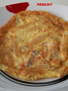 Una foto de Tortilla de espárragos con ahumados en aceite de oliva