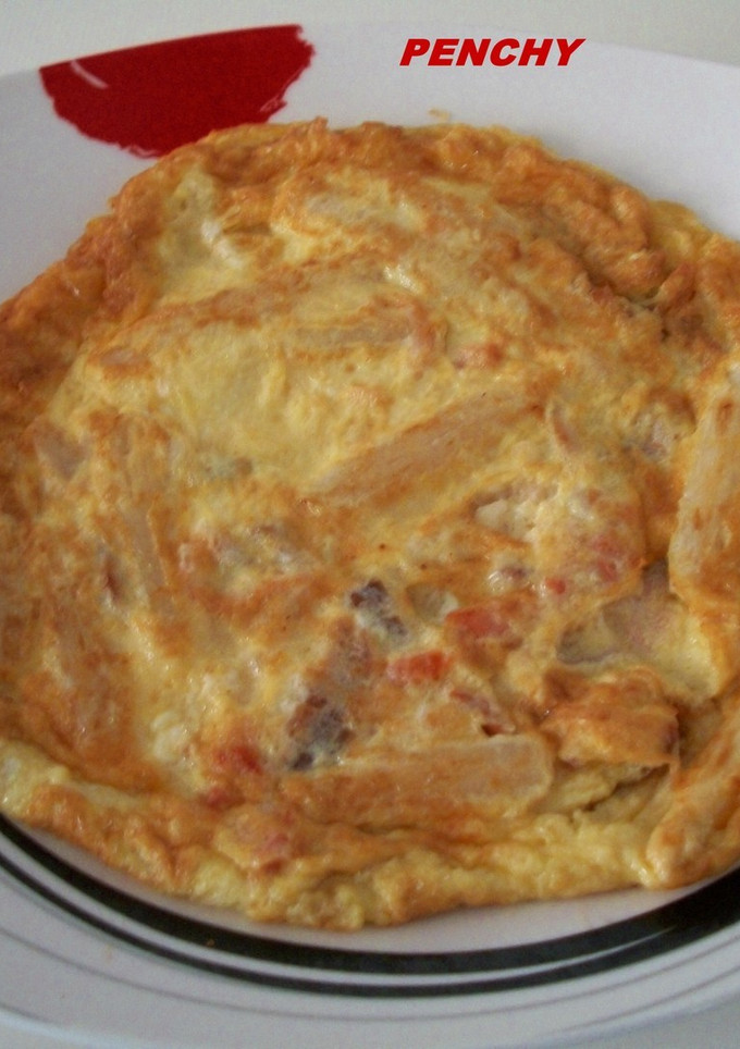 Una foto de Tortilla de espárragos con ahumados en aceite de oliva
