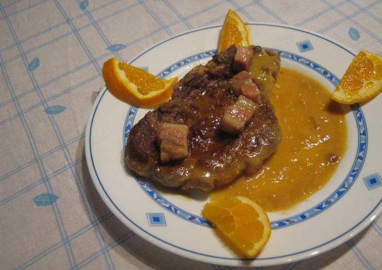 Chuletas de cerdo a la cerveza y naranjas
