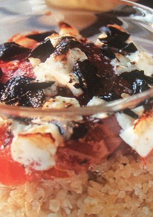 Una foto de Gratinado de arroz integral con tomates y queso feta